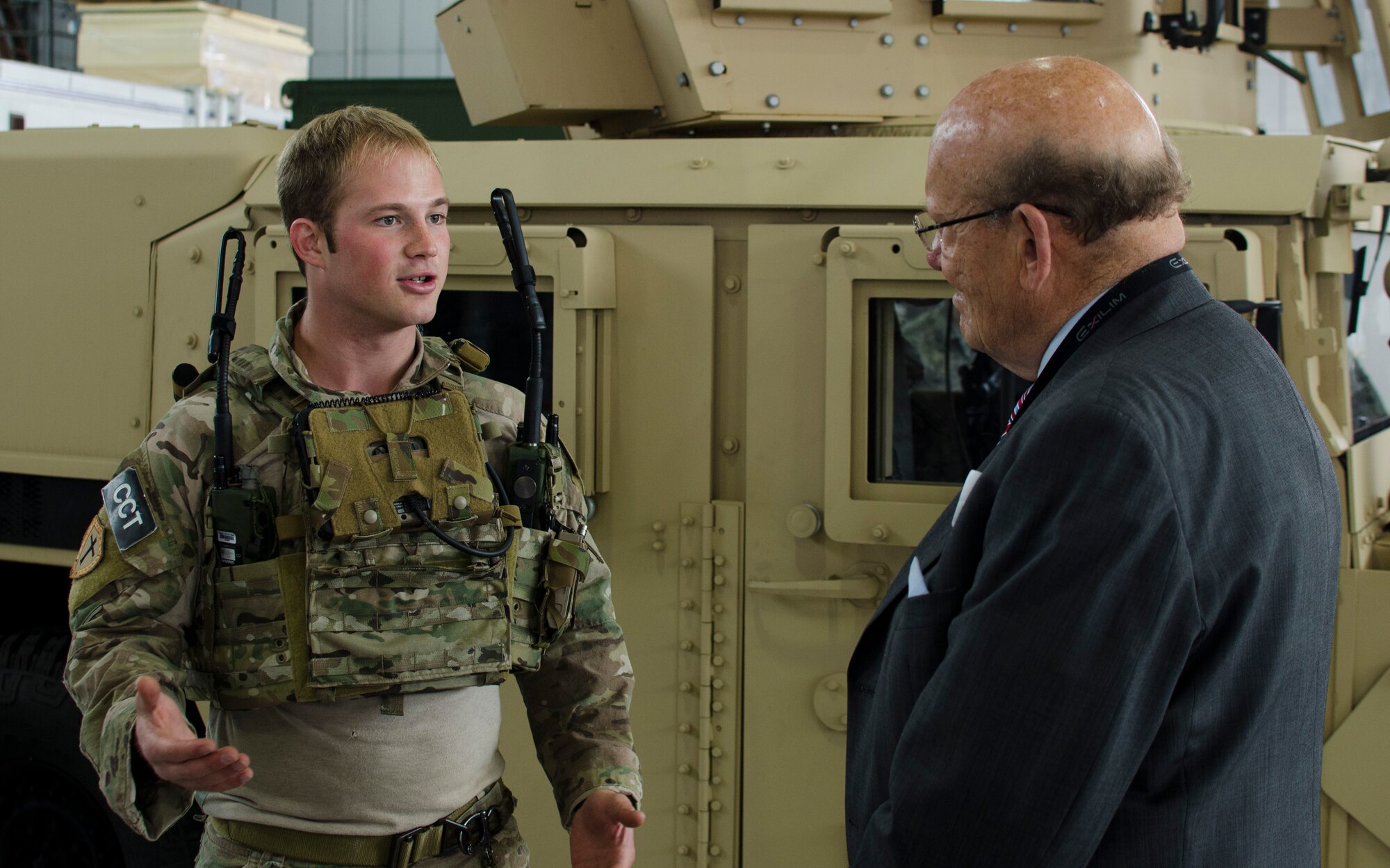 From left, Staff Sgt. William James, 321st Special Tactics Squadron combat controller, speaks to Councillor David Wheeler, Chairman of the Freckenham Parish Council, about the 352nd Special Operations Group mission during a civic leader visit June 21, 2013, on RAF Mildenhall, England. More than 60 community leaders, landowners and other distinguished visitors attended a joint 100th Air Refueling Wing and 352nd SOG civic leader event focused on showcasing the 352nd SOG and its ongoing expansion. (U.S. Air Force photo by Staff Sgt. Stephen Linch/Released)