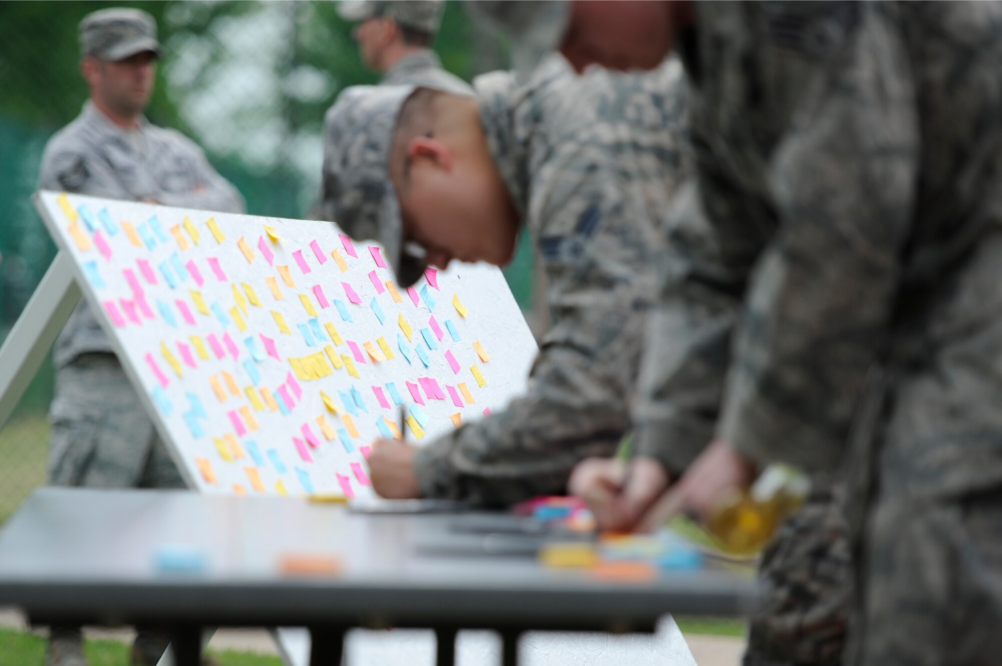 KUNSAN AIR BASE, Republic of Korea – A message board was set up for Wolf Pack members to write a note to victims of sexual assault, at the fitness center track, June 21, 2013. Members of the 8th Fighter Wing walked along the track to observe a ‘silent walk’ memorial display. (U.S. Air Force photo by Staff Sgt. Tong Duong)