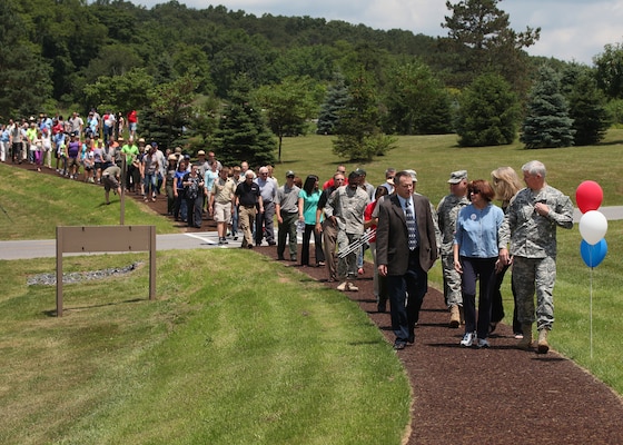 (l to r) Acting Operations Manager, Jude Harrington; Jo-Ellen Darcy, Assistant Secretary of the Army for Civil Works; and Maj. Gen. Michael J. Walsh, Corps Deputy Commander for Civil Works and Emergency Operations  take a walk in the ‘greenside’, the Greenside Pathway at Raytown Lake, June 20.