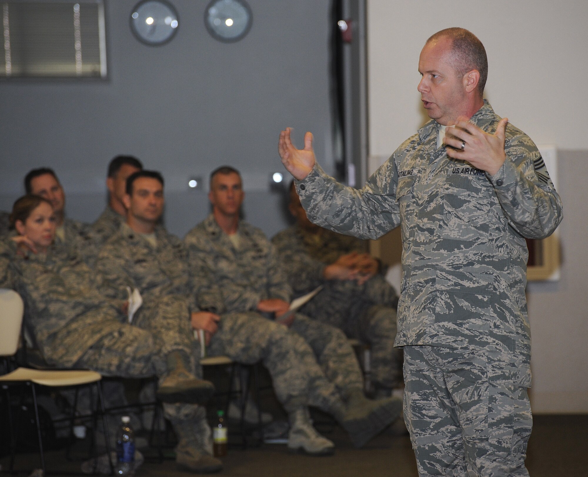 Chief Master Sgt. of the Air National Guard James W. Hotaling addresses the Combat Operations Group of the Oregon Air National Guard during a town hall event at Camp Rilea, Ore., June 20, 2013. Hotaling, a former member of the Oregon Air Guard, took questions about changes and policies that effect citizen Airmen during his visit. (Air National Guard photo by Tech. Sgt. John Hughel, 142nd Fighter Wing Public Affairs)