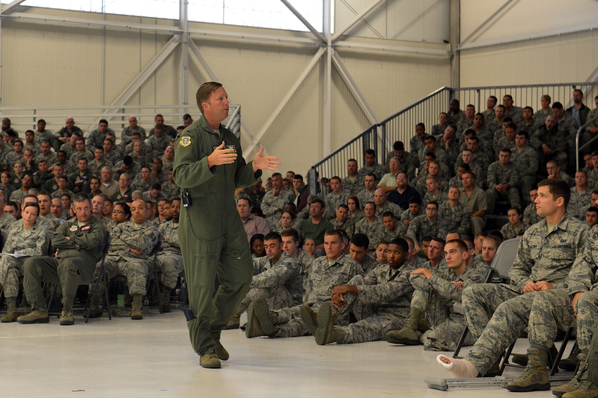 Col. Wyn Elder, 62nd Airlift Wing commander, explains reporting options for victims of sexual assault June 25, 2013 at Joint Base Lewis-McChord, Wash. Airmen and civilians across Joint Base Lewis-McChord stood down normal operations June 24 and 25 for a Sexual Assault Prevention and Response down day. (U.S. Air Force photo/Airman 1st Class Jacob Jimenez)      