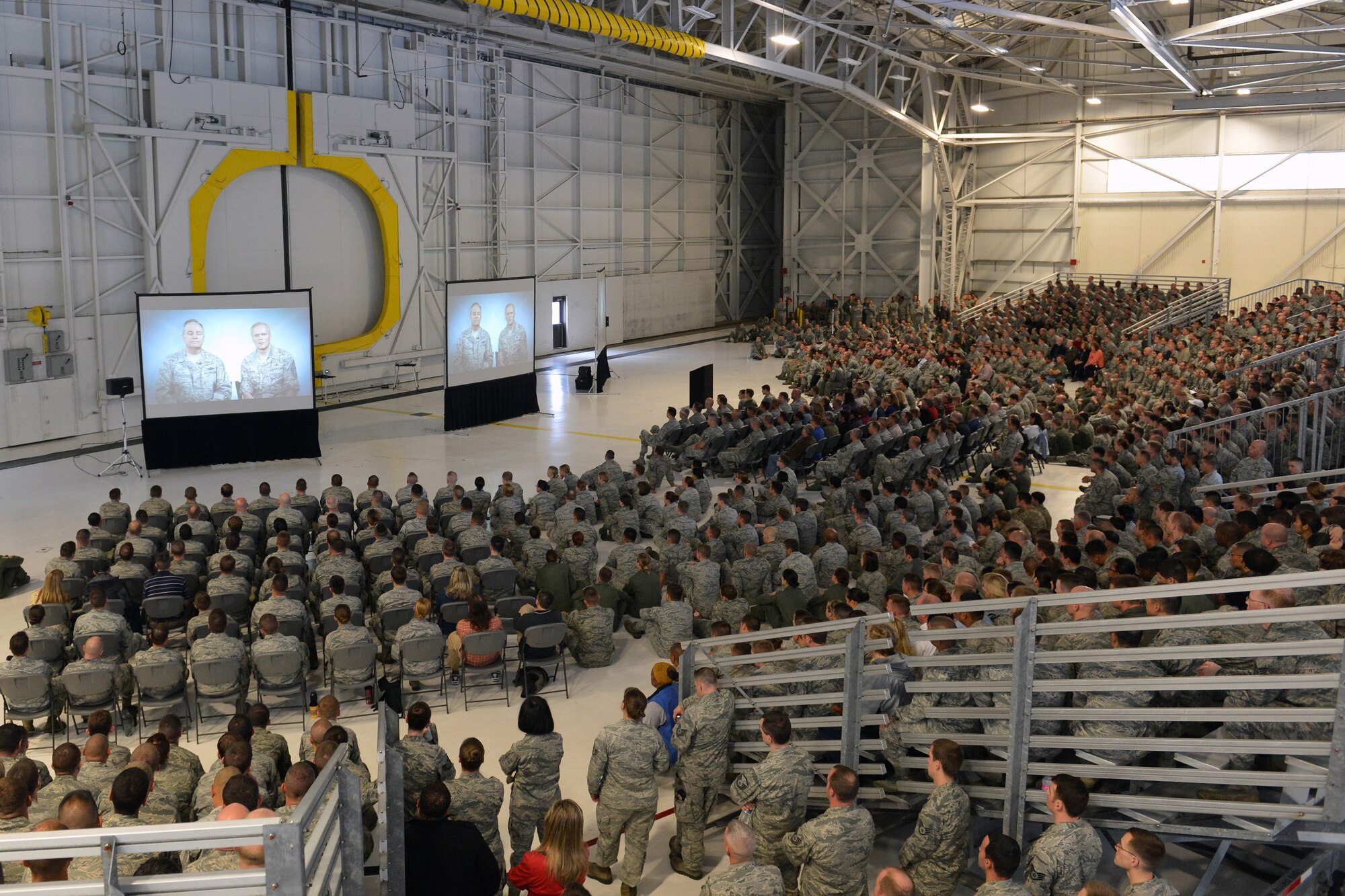 Airmen and civilians across Joint Base Lewis-McChord, Wash., watch a video of Air Force Chief of Staff Gen. Mark A. Welsh III and Chief Master Sgt. of the Air Force James Cody, pertaining to sexual assault prevention and response June 25, 2013 at JBLM. The SAPR Program reinforces the Air Force's commitment to eliminate incidents of sexual assault through awareness and prevention training, education, victim advocacy, response, reporting and accountability. (U.S. Air Force photo/Airman 1st Class Jacob Jimenez)  