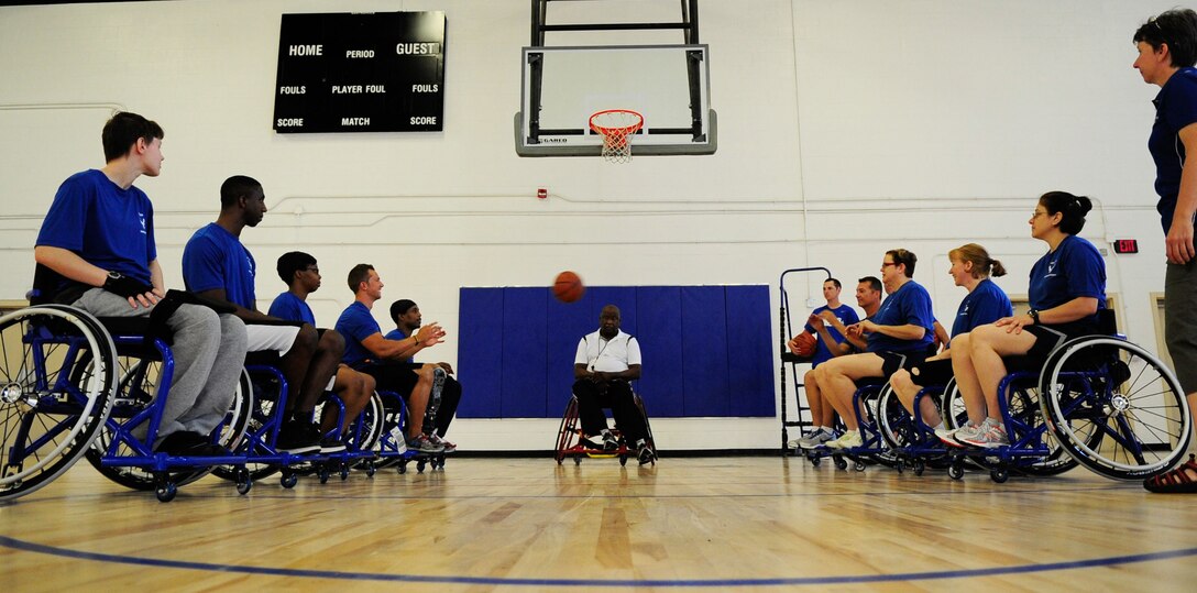 Wounded Warriors learn to play wheelchair basketball during an Air Force Wounded Warrior Adaptive Sports Training Camp at the West Fitness Center at Joint Base Andrews, Md., June 26, 2013. (U.S. Air Force photo/Senior Airman Lauren Main)