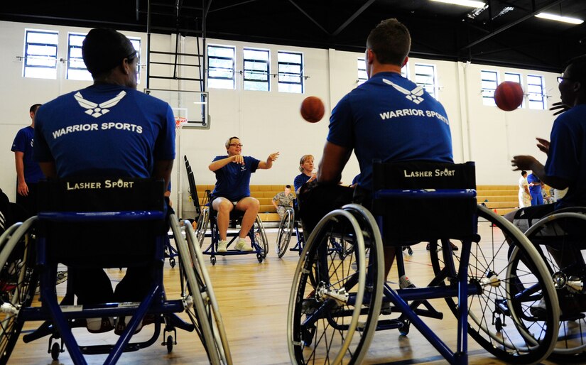 Wounded Warriors learn to play wheelchair basketball during an Air Force Wounded Warrior Adaptive Sports Training Camp at the West Fitness Center at Joint Base Andrews, Md., June 26, 2013. (U.S. Air Force photo/Senior Airman Lauren Main)