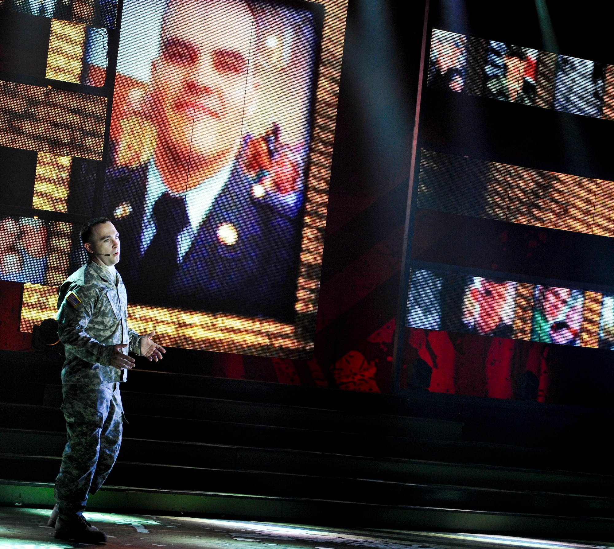 U.S. Army Spc. Reuben Eldridge, 2013 Army Soldier Show cast member, performs during the gold star tribute portion of performance at Fort Eustis, Va., June 25. The gold star portion pays tribute to families who lost a loved one in the line of duty. (U.S. Air Force photo by Staff Sgt. Wesley Farnsworth / Released)

