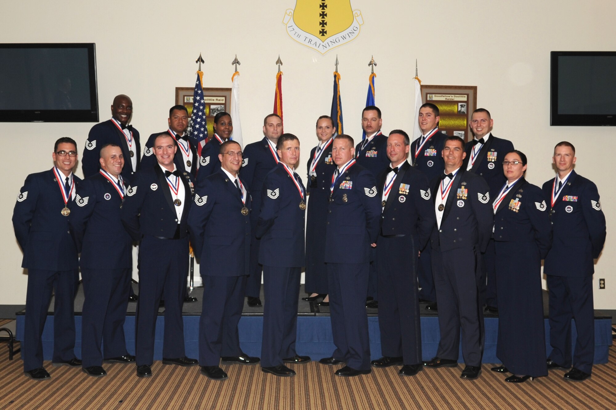 GOODFELLOW AIR FORCE BASE, Texas -- The newest group of Senior NCO inductees stand for a photo, June 21. (U.S. Air Force photo by Staff Sgt. Laura R. McFarlane)