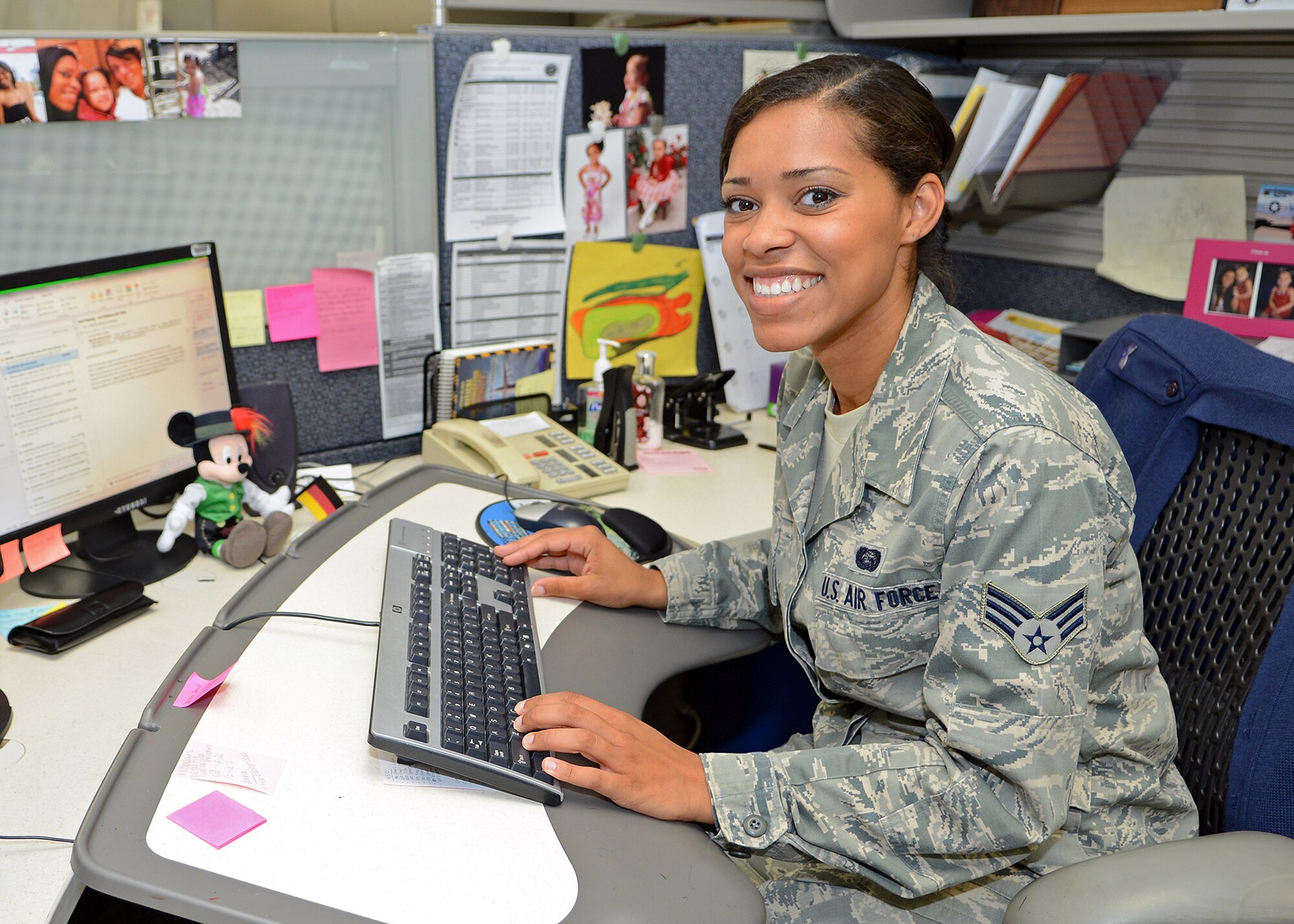 Senior Airman Samantha Couch, a career development journeyman with the 412th Force Support Squadron, was granted her citizenship June 6, 2013. (U.S. Air Force photo by Jet Fabara)