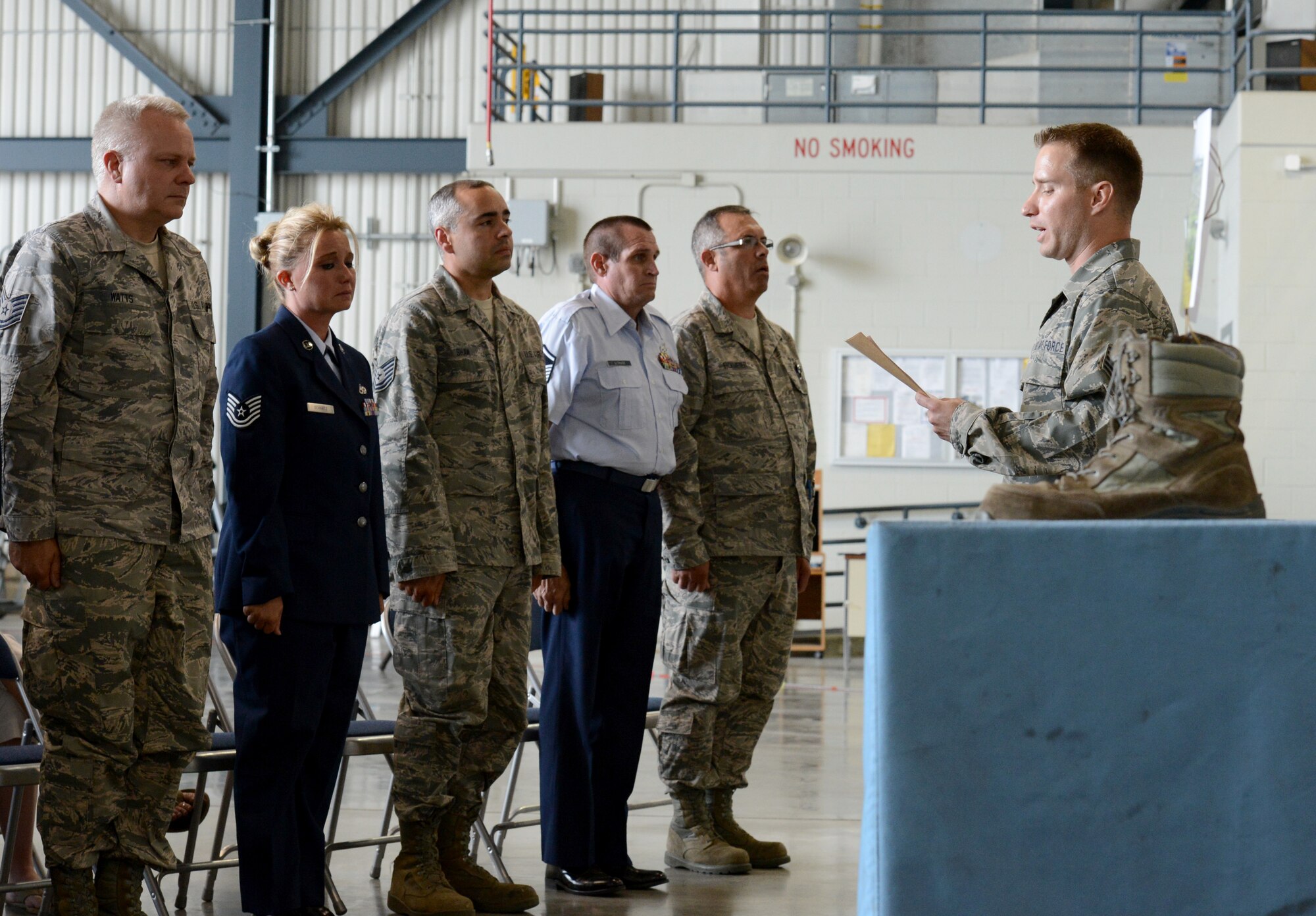 U.S. Air Force Tech Sgt. Brandon Viet, a member of the Nebraska Air National Guard’s 155th Air Refueling Wing, performs a ceremonious roll call during a memorial service for Senior Airman Dale Butler at the Nebraska National Guard air base in Lincoln, Neb., June 8, 2013. The memorial ceremony honored Butler who was killed in a civilian aircraft accident near Norfolk, Neb., April 27, 2013. (U.S. Air National Guard photo by Staff Sgt. James Lieth/Released)    