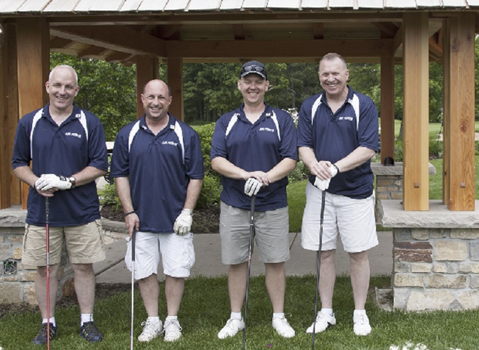 From left, Senior Master Sgt. Mark Stodola, Master Sgt. Tonly Gamboni, Lt. Col. Ted Ruminsky and Master Sgt. Joe Wiatros from the 934th Security Forces Squadron at the Wounded Warrior Golf Tournament. (Courtesy Photo)