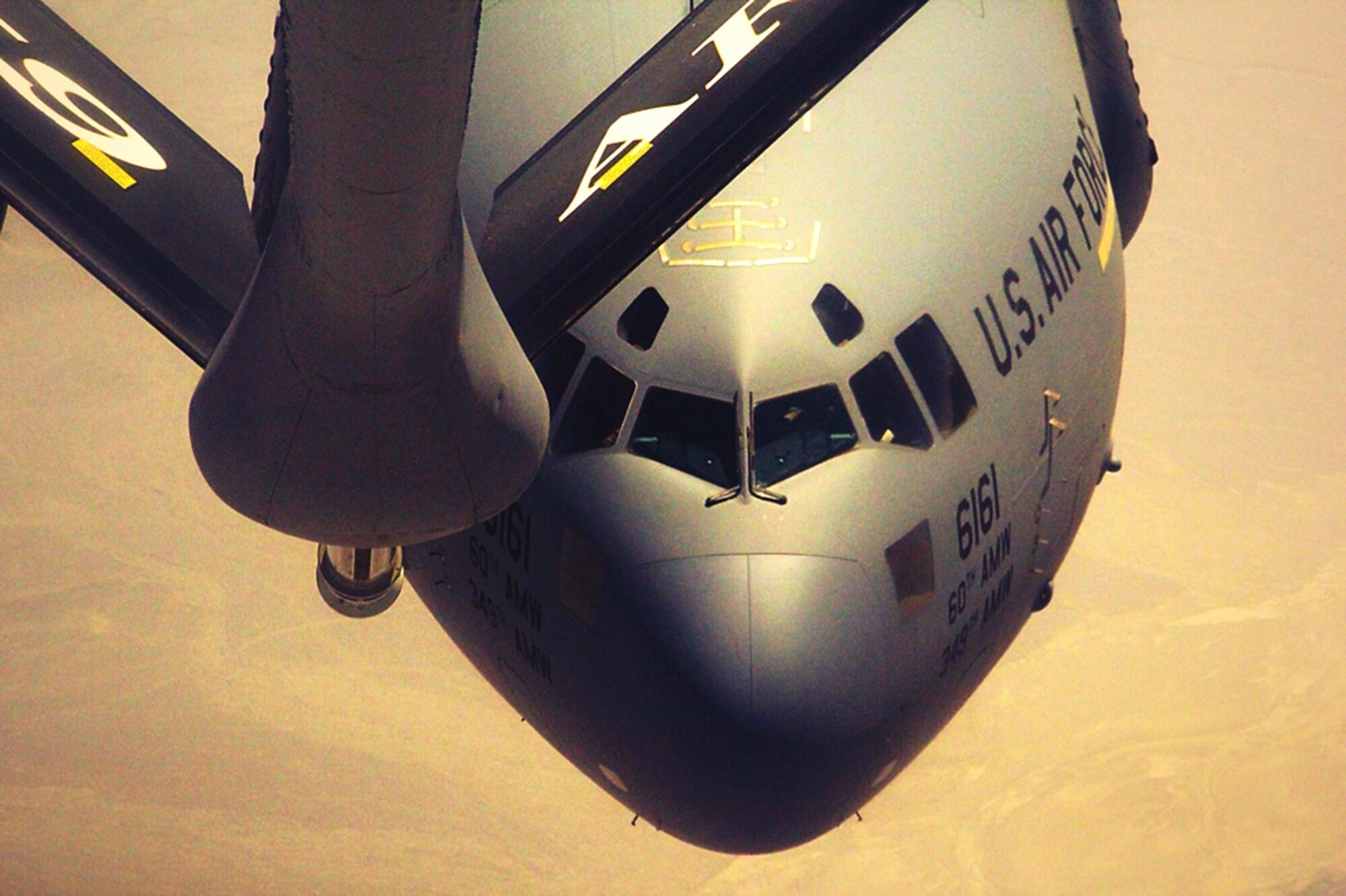 WRIGHT-PATTERSON AIR FORCE BASE, Ohio – A KC-135 Stratotanker from the 459th Air Refueling Wing, Joint Base Andrews, Md., refuels a C-17 Globemaster III over Southwest Asia. The C-17 is being flown by members of the 89th Airlift Squadron currently augmenting an active duty crew while deployed with the 385th Air Expeditionary Group, Detachment 1. (Courtesy photo)