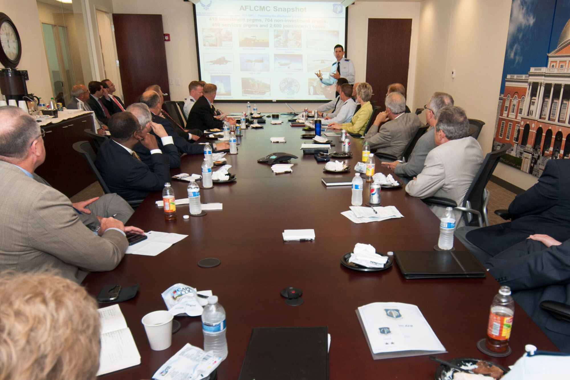 WALTHAM, Mass. -- Air Force Life Cycle Management Center Commander Lt. Gen. C.D. Moore II talks with regional business executives at a "CEO Roundtable" sponsored by the Mass. High Tech Council's Defense Technology Initiative June 26. The general shared information about the key objectives and early successes of LCMC, and Hanscom Air Force Base's critical role, and also received feedback and advice from participants. (U.S. Air Force photo by Rick Berry)