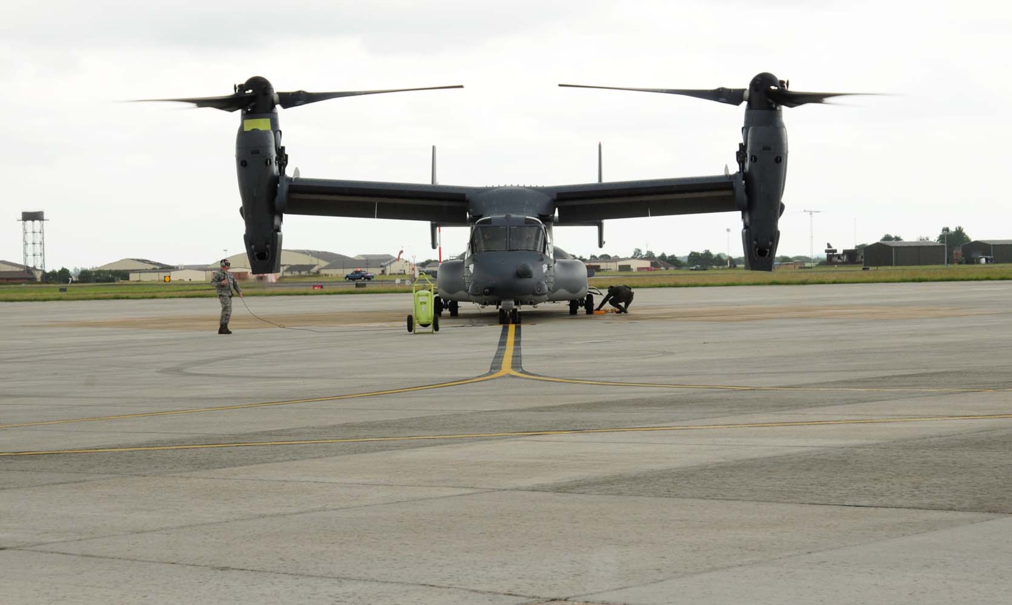 The CV-22B Osprey crew initiates shut-down procedures June 24, 2013, after landing on RAF Mildenhall, England. The CV-22 fills the role previously accomplished by the MH-53 Pave Low helicopter at the 352nd Special Operations Group. However, it combines the vertical takeoff, hover and vertical-landing qualities of a helicopter with the long-range, fuel-efficiency and speed of a turboprop aircraft. (U.S. Air Force photo by Karen Abeyasekere/Released)