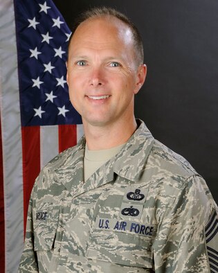 U.S. Air Force Chief Master Sgt. Ed Bruce, 245th Air Traffic Control Squadron at McEntire Joint National Guard Base, South Carolina Air National Guard, poses for his official portrait June 21, 2013.  (U.S. Air National Guard photo by Tech. Sgt. Caycee Watson/Released)