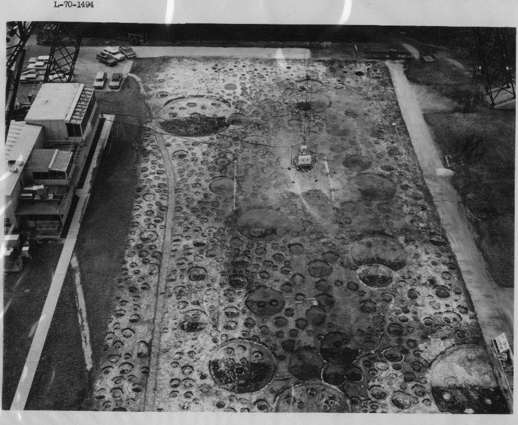 In one of many efforts to make the astronaut training as realistic as possible, the engineers at the National Aeronautics and Space Administration Langley Research Center in Hampton, Va., created a “moonscape” complete with craters, using dust thought to closely resemble the material found on the moon’s surface. It was mentioned in an interview with Neil Armstrong, the first man to walk on the moon, the lunar surface was “like Langley.” (NASA courtesy photo/Released)