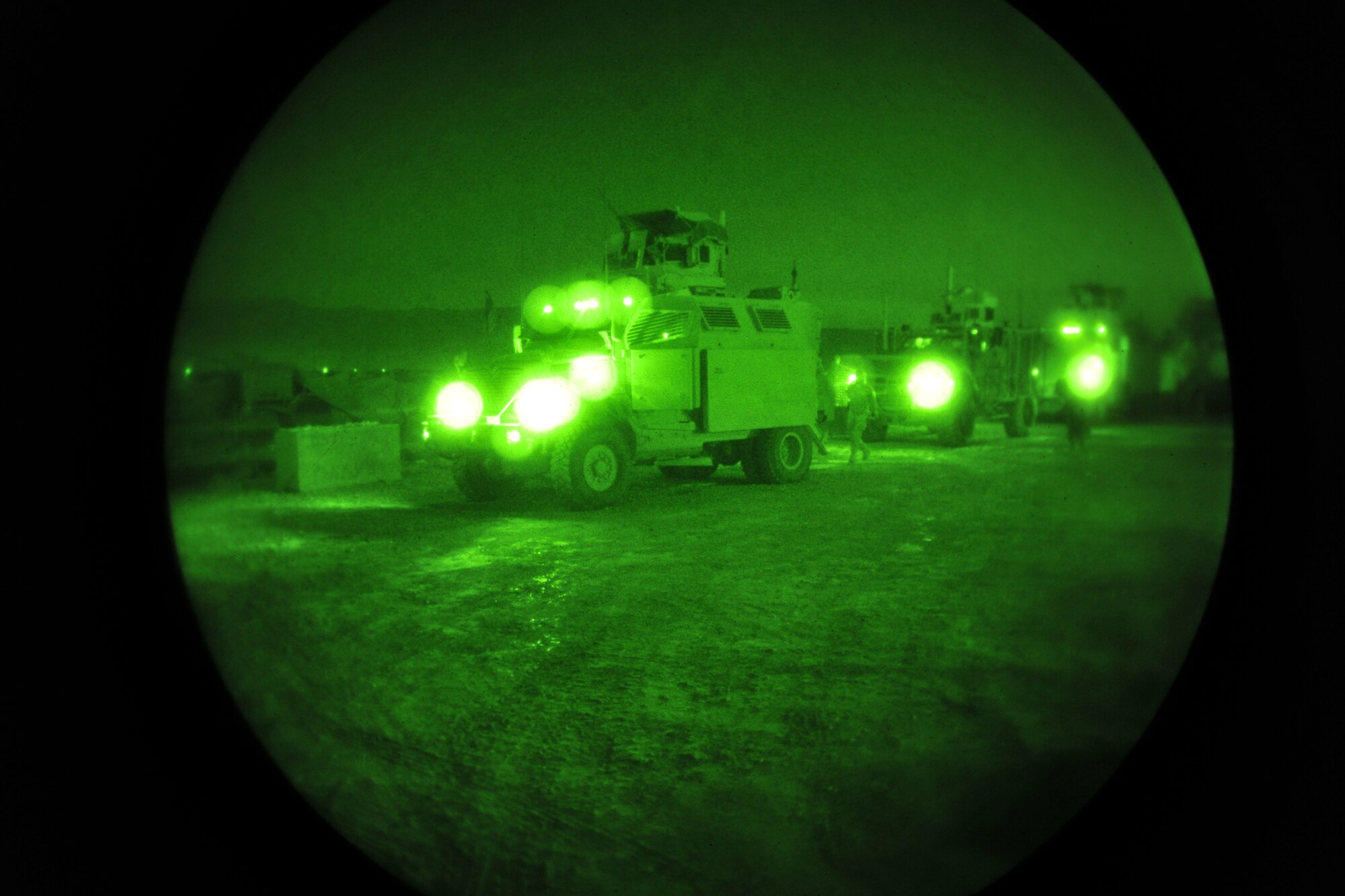 Airmen from the 755th Expeditionary Security Forces Squadron Reaper team prepare to mount up during a recent early morning mission at Bagram Airfield, Afghanistan. This group of security forces Airmen operates missions “outside the wire” providing security for the personnel at Bagram Airfield. (U.S. Air Force photo/Senior Airman Chris Willis)
