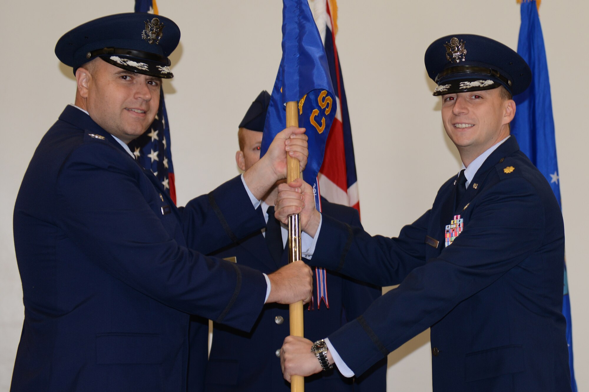 Maj. John Riester assumes command of the 423rd Communication Squadron from Col. Steve Sweeney, 423rd Air Base Group commander, in a change of command ceremony at the RAF Molesworth June 24. (U.S. Air Force photo by Tech. Sgt. Chrissy Best)