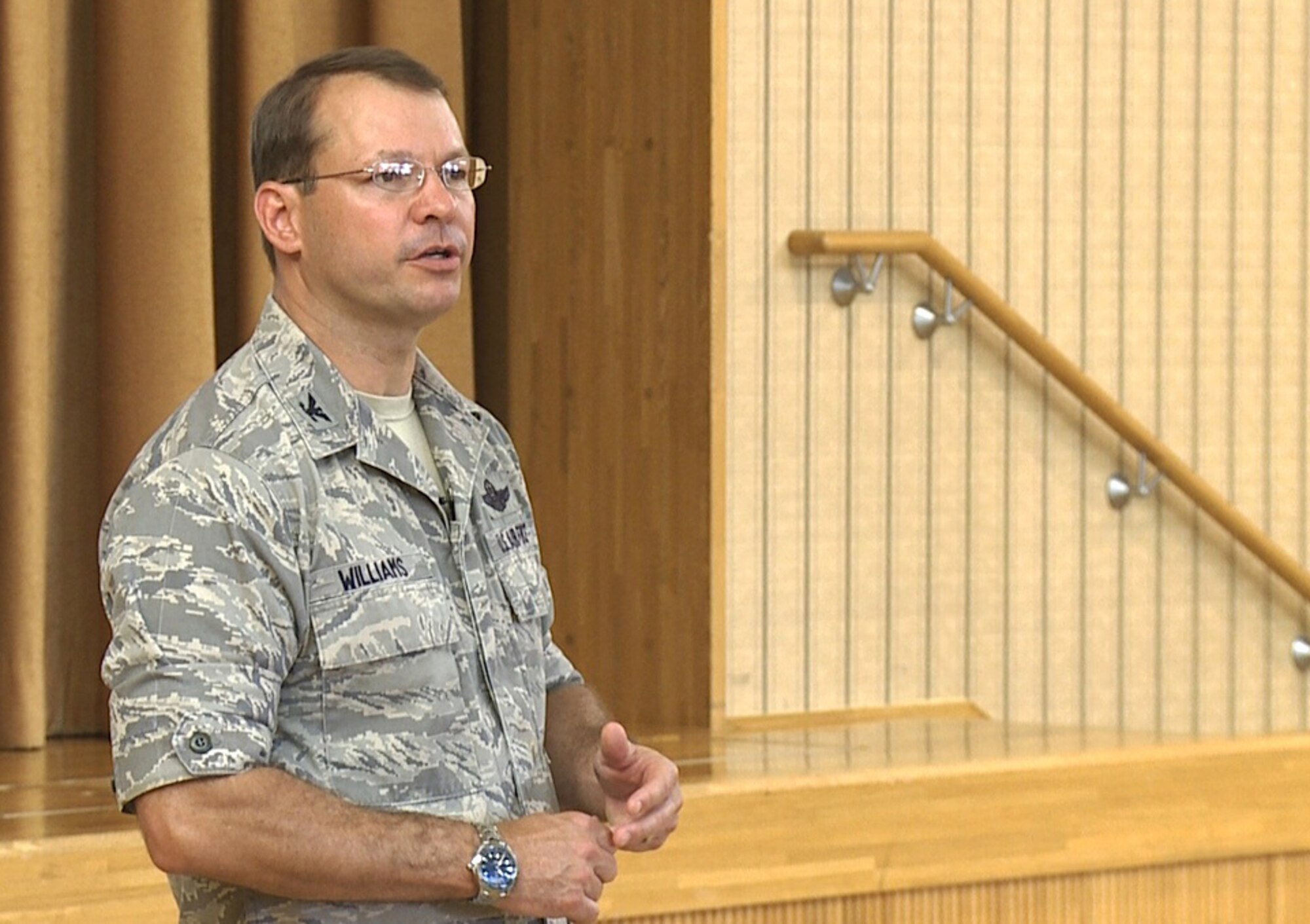 U.S. Air Force Col. Stephen Williams, 35th Fighter Wing commander, addresses the wing during a stand-down day for Sexual Assault Prevention and Response training at Misawa Air Base, Japan, June 24, 2013. The base also held wing-wide training where units were given materials to guide conversations and arm Airmen with information on sexual assault, reporting procedures and help agencies. (U.S. Air Force photo by Senior Airman Ashley Clingerman)