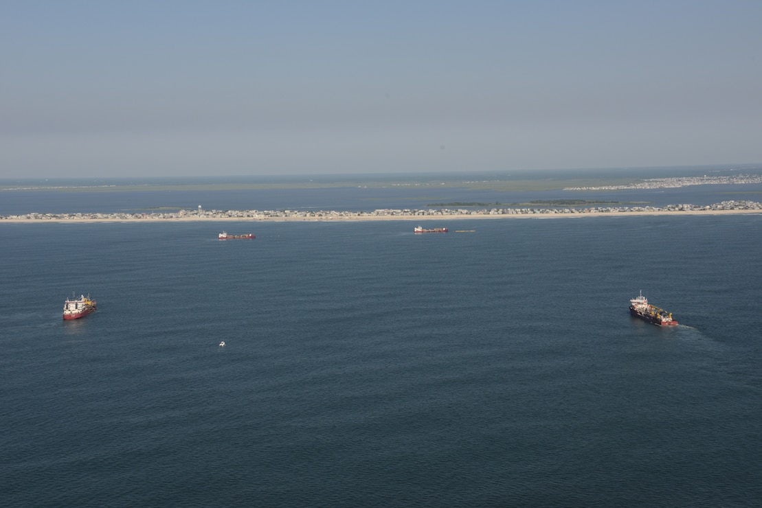 The Dredges Liberty Island, Dodge Island, Padre Island and Terrapin Island, of Great Lakes Dredge & Dock Company, pump sand onto Brant Beach, NJ in June of 2013.