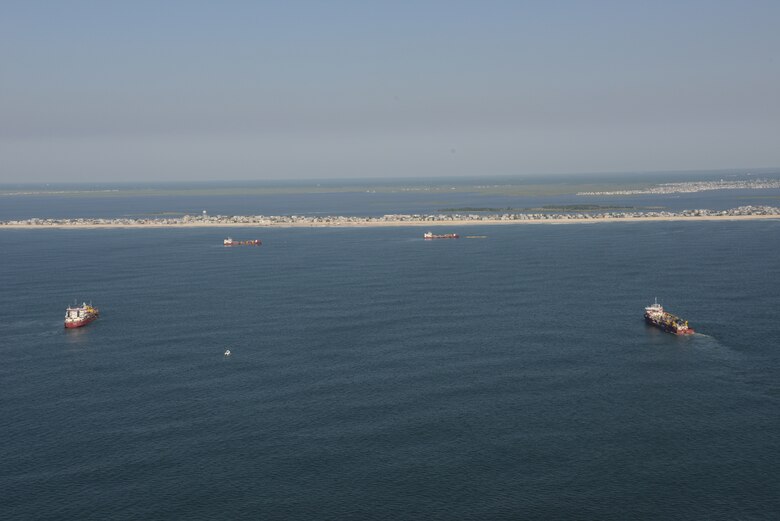 The Dredges Liberty Island, Dodge Island, Padre Island and Terrapin Island, of Great Lakes Dredge & Dock Company, pump sand onto Brant Beach, NJ in June of 2013. The work is part of an effort by the U.S. Army Corps of Engineers Philadelphia District to restore its Coastal Storm Risk Management projects. 