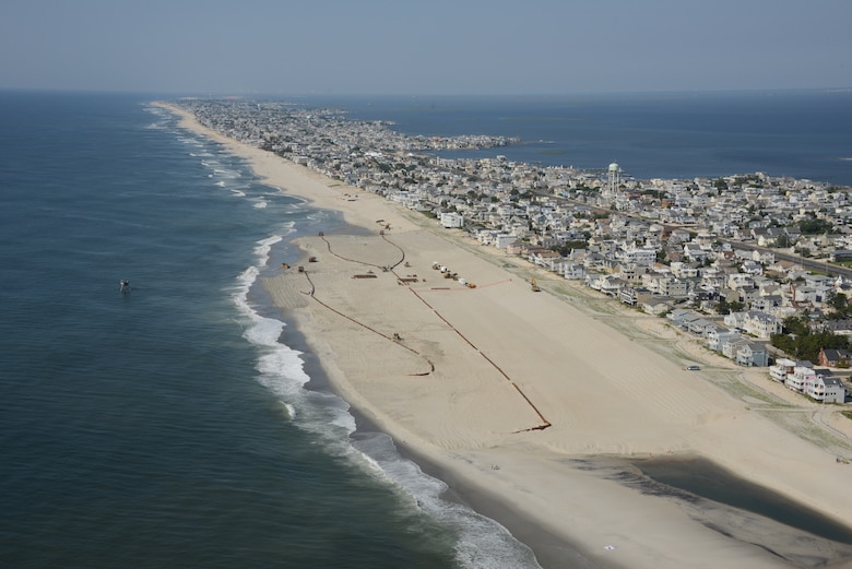 The U.S. Army Corps of Engineers Philadelphia District pumps sand onto Brant Beach, NJ in June of 2013. The work is part of an effort to restore the Coastal Storm Risk Management project from damages associated with Hurricane Sandy.
