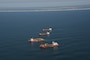 The Dredges Liberty Island (front), Dodge Island, Padre Island and Terrapin Island, of Great Lakes Dredge & Dock Company, transit offshore to dredge sand and pump it onto Long Beach Island, NJ in June of 2013. 