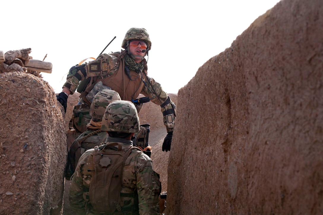 Georgian soldiers search a compound during Operation Northern Lion in ...