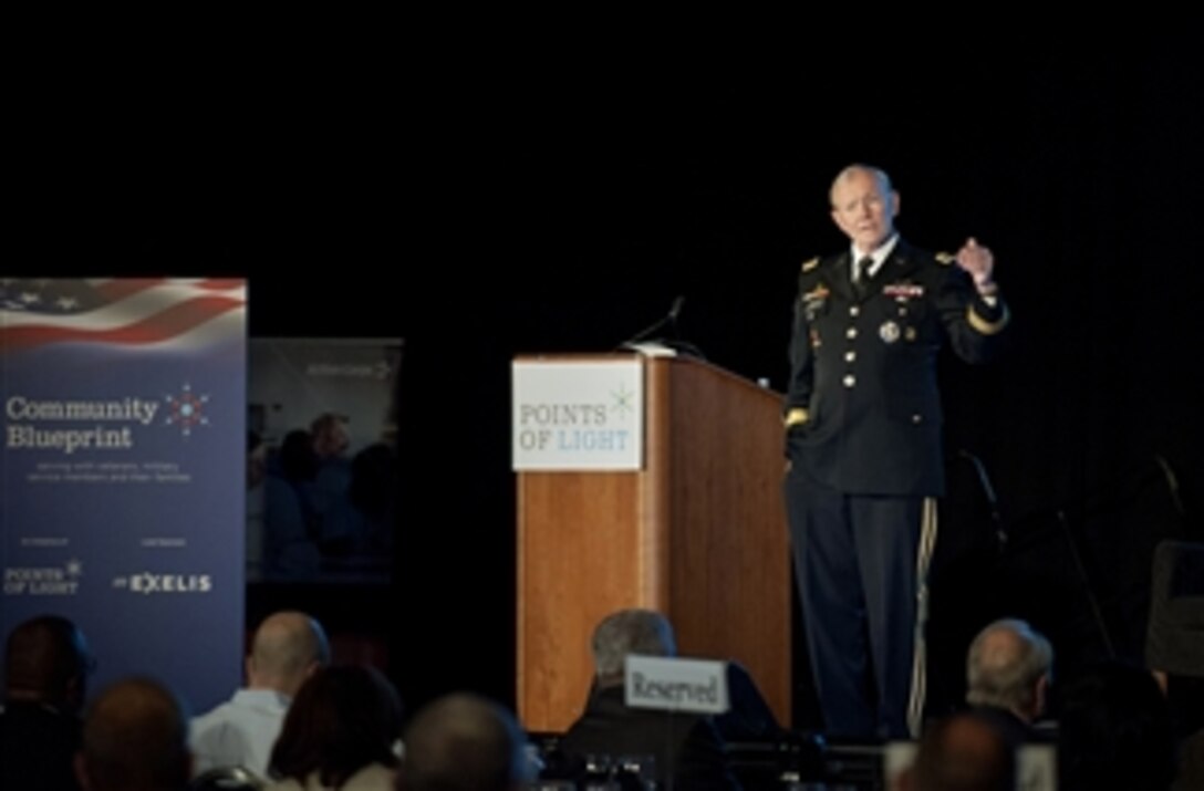 Chairman of the Joint Chiefs of Staff Gen. Martin E. Dempsey addresses the audience at the Points of Light Conference on Volunteering and Service Military Summit in Washington, D.C., on June 21, 2013.  Dempsey referenced George H.W. Bush's 1991 State of the Union address emphasizing, "Each [service member] has volunteered to provide for this nation's defense … our commitment to them must be equal to their commitment to our country."  