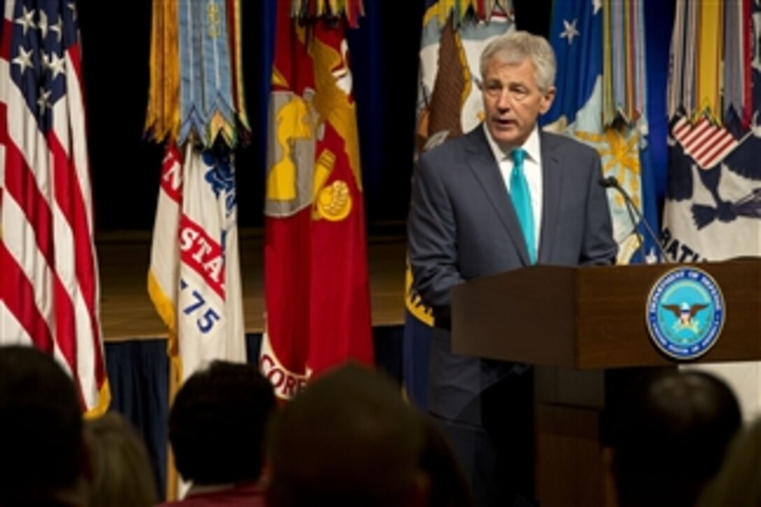 Secretary of Defense Chuck Hagel gives his opening remarks and introduces Senior Advisor to President Obama Valerie Jarrett at the Defense Department Pride event recognizing Lesbian, Gay, Bisexual and Transgender pride at the Pentagon in Arlington, Va., on June 25, 2013.  Hagel noted that since the repeal of don't ask, don't tell, the department and armed forces are stronger.  