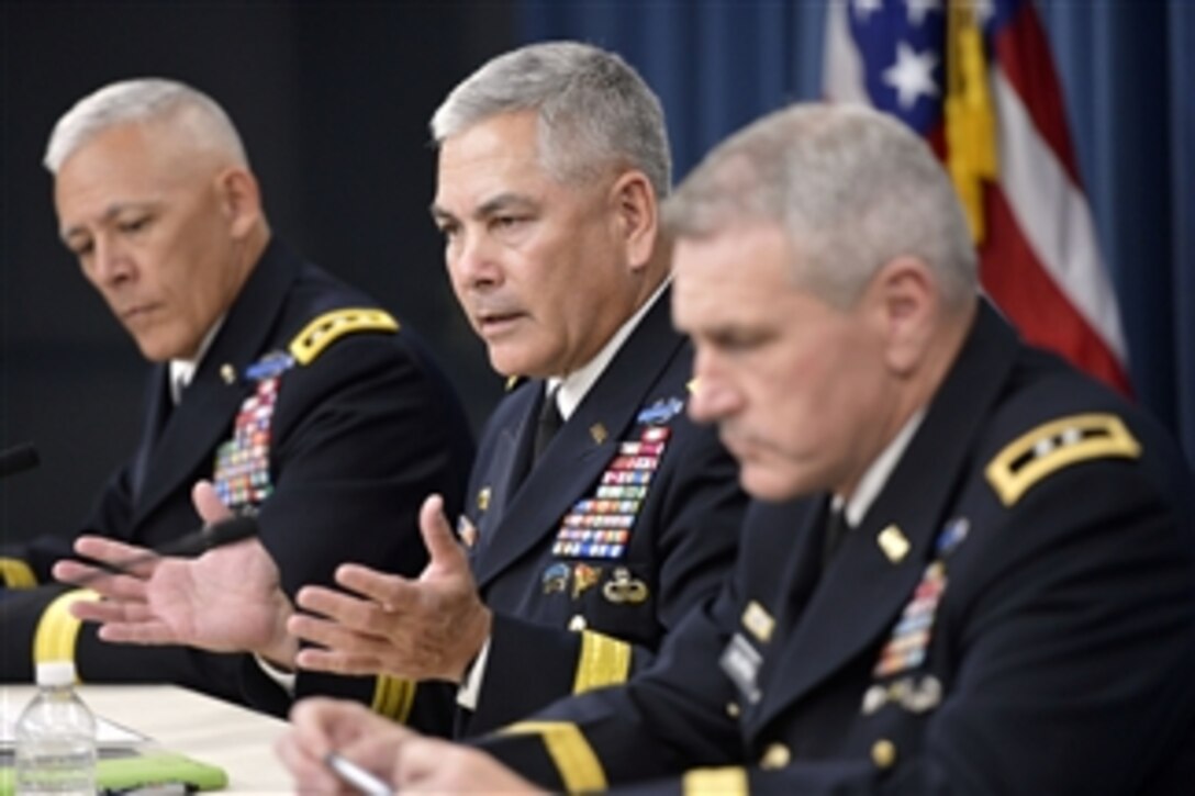 U.S. Army Gen. John F. Campbell, center, briefs the media on specific impending cuts and realignments within the Army's force structure during a press conference in the Pentagon in Arlington, Va., on June 25, 2013.   Chief of Staff of the Army General Ray Odierno earlier announced that the Army will reduce its number of brigade combat teams from 45 to 33 and shrink its active component end strength by 14 percent, or 80,000 soldiers, to 490,000, from a wartime high of 570,000.  Lt. Gen. James L. Huggins, left, and Maj. Gen. John M. Murray joined Campbell, right, at the follow-up briefing after Odierno.  