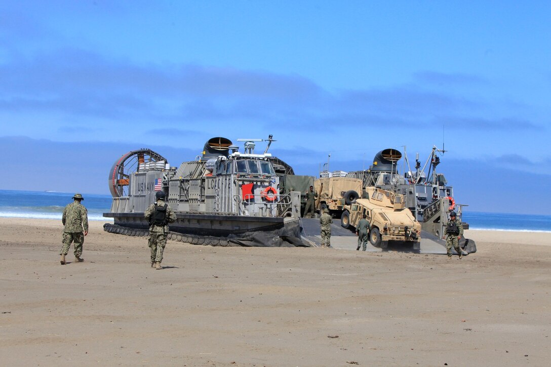 U.S. Marines with Battalion Landing Team 1/4, 13th Marine Expeditionary Unit, prepare to retrograde back to the USS Boxer during PHIBRON MEU Integration at Camp Pendleton, Calif., June 27, 2013. PMINT is a three week long pre-deployment training event focusing on the combined Marine Expeditionary Unit and Amphibious Ready Group capabilities and the strengthening of the Navy and Marine Corps team.