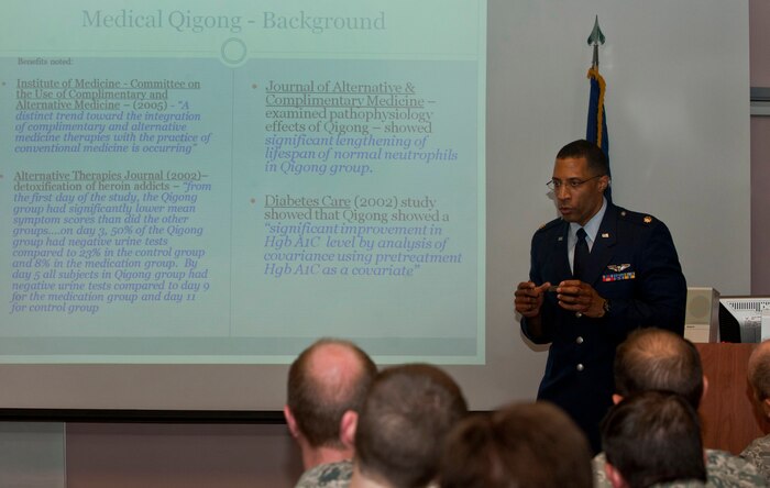 U.S. Air Force Maj. (Dr.) Eric Abbott, 99th Medical Operations Squadron family medicine resident physician, briefs fellow resident graduates and peers during the second annual Clinical Investigation Program Research Symposium June 26, 2013, at Nellis Air Force Base, Nev. Abbott’s research project was on Qigong, which is a traditional Chinese medicine, and its effects on people suffering with diabetes. (U.S. Air Force photo by Senior Airman Daniel Hughes)  