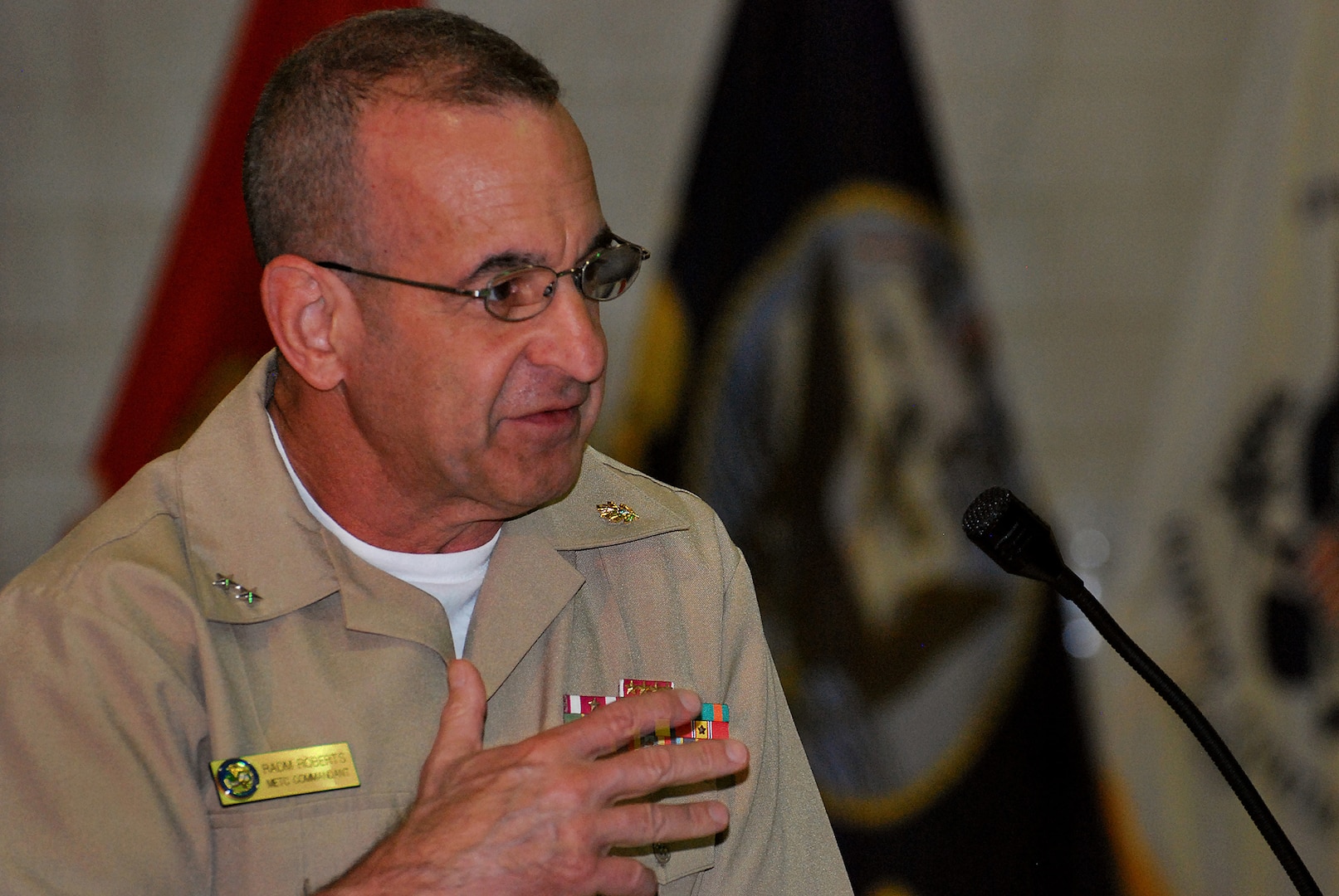 Rear Adm. William Roberts, commandant, Medical, Education and Training Campus, spoke from his heart during his keynote presentation at the June 25 ribbon-cutting ceremony officially opening the Wounded, Ill & Injured Annex at the Navy Operational Support Center, Joint Base San Antonio-Fort Sam Houston. The Annex will serve as an administrative liaison for Navy, Marine Corps and Coast Guard members receiving treatment through the San Antonio Military Medical Center at JBSH-FSH. Annex staff will also provide support to service members' families and a better means of communication, patient advocacy and navigation through complex medical issues while service members receive treatment. The Annex is a detachment of the Naval Health Clinic Corpus Christi.