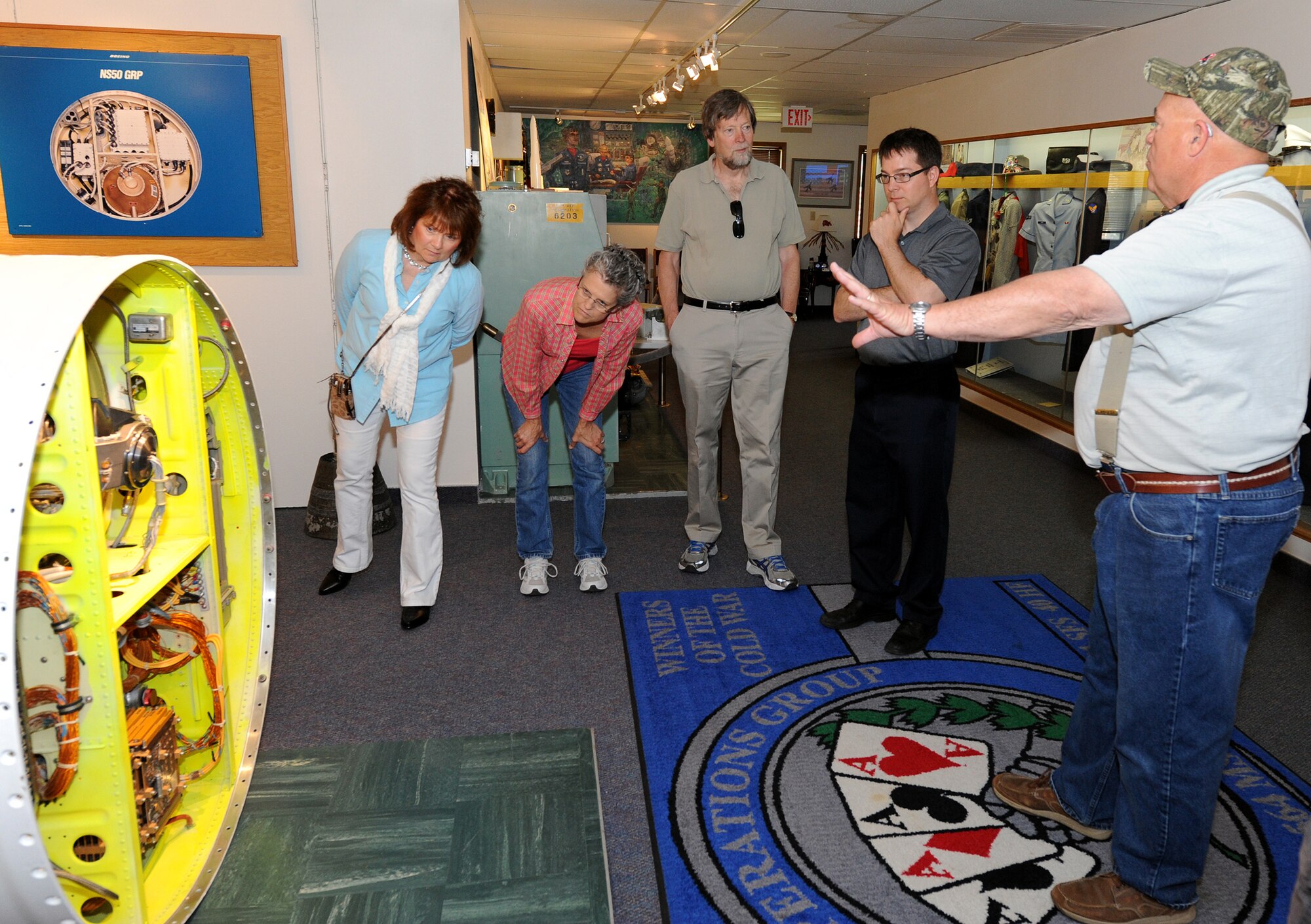 Curt Shannon, Malmstrom Air Force Base Museum director, conducts a museum tour June 18 for more than 35 teachers. The Great Falls, Bozeman, and Helena, Mont., kindergarten to 12th grade instructors all visited the museum as part of a three-year grant program to gain professional development in American history education. (U.S. Air Force photo/Staff Sgt. R.J. Biermann)