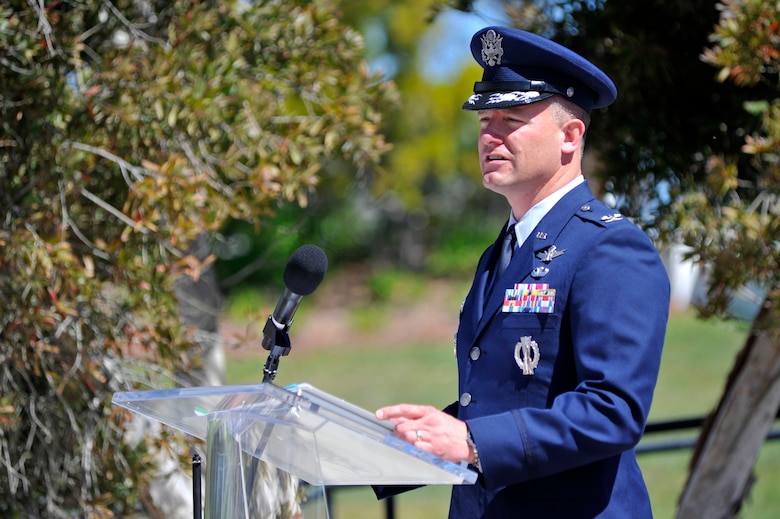 VANDENBERG AIR FORCE BASE, Calif. --  Col. David Hook, departing 30th  Operations Group commander, addresses 30 OG members and guests during a change of command ceremony here Tuesday, June 25. Hook commanded the 30 OG from June 2011 to June 2013 and is retiring from the Air Force after his command is complete. (U.S. Air Force photo/Michael Peterson)