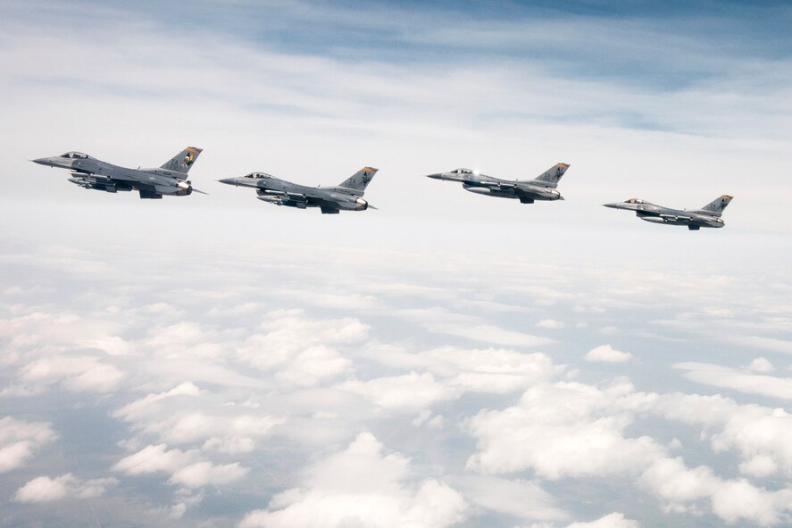 On Thursday, June 20, 2013 F-16 Fighting Falcon aircraft from the 132nd Fighter Wing (132FW), Des Moines, Iowa are seen flying in the skies over Iowa.  The 132FW is currently taking on a new mission to operate MQ-9 Reaper aircraft.  (U.S. Air National Guard photo by Staff Sgt. Linda K. Burger/Released)