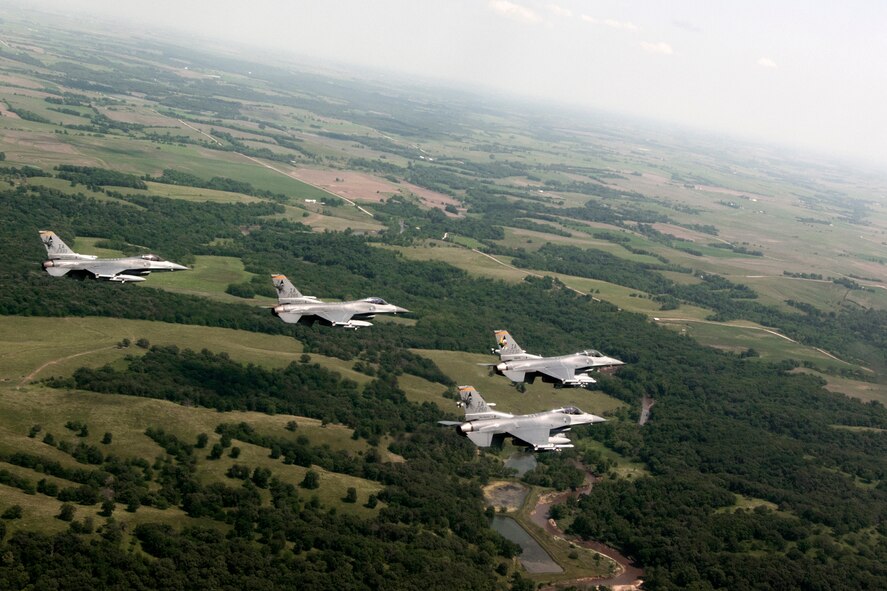 On Thursday, June 20, 2013 F-16 Fighting Falcon aircraft from the 132nd Fighter Wing (132FW), Des Moines, Iowa are seen flying in the skies over Iowa.  The 132FW is currently taking on a new mission to operate MQ-9 Reaper aircraft.  (U.S. Air National Guard photo by Staff Sgt. Linda K. Burger/Released)