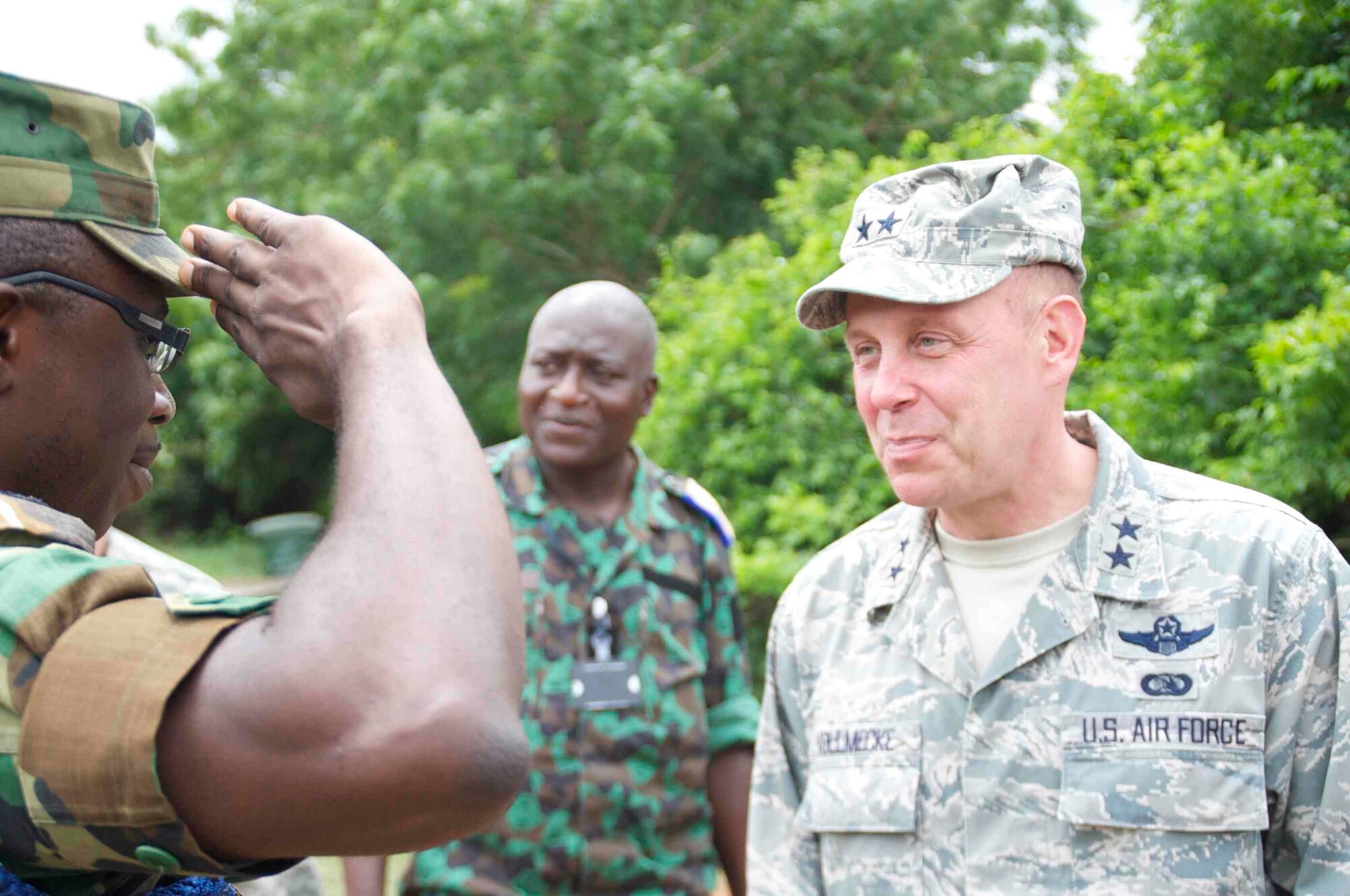 Maj. Gen. Eric Vollmecke, Western Accord 13 deputy exercise director, is saluted before touring the Bundase training camp near Accra, Ghana, June 19. Western Accord 13 is a mutually beneficial exercise hosted by U.S. Army Africa that brings together the Economic Community of West African States and the US Army to have increased capabilities to support regional peacekeeping operations. (Photos by: Sgt. Tyler Sletten, 116th Public Affairs Detachment)