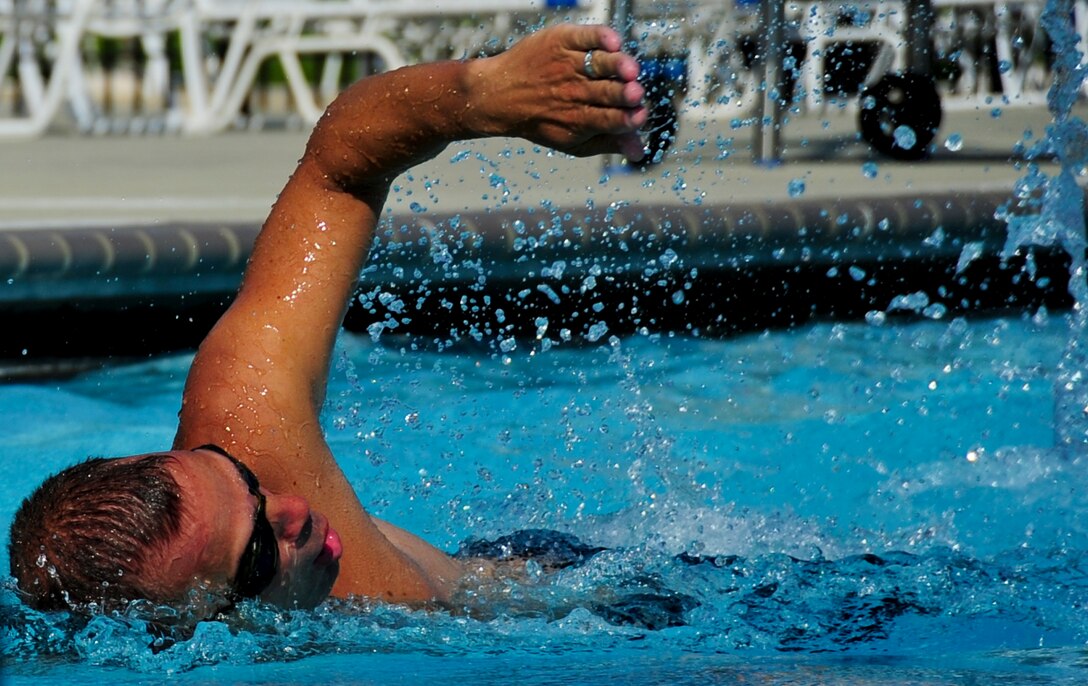 An Air Force Wounded Warrior practices swimming techniques during the Air Force Warrior Adaptive Sports Camp at Joint Base Andrews, Md., June 26, 2013. The camp was intended to introduce the warriors to adaptive sports during their early stages of recovery. (U.S. Air Force photo/Airman 1st Class Erin O’Shea)
