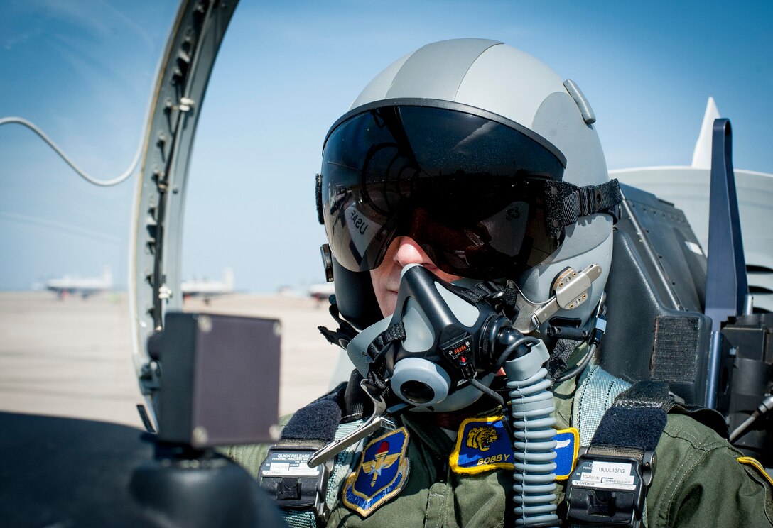 Capt. Bobby Scott, 85th Flying Training Squadron instructor pilot, sits in a T-6A Texan II aircraft at Laughlin Air Force Base, Texas, June 26, 2013. In fiscal 2012, Laughlin pilots flew 80,779 flying hours and graduated 358 pilots, the highest in Air Education and Training Command. (U.S. Air Force photo/Airman 1st Class John D. Partlow)