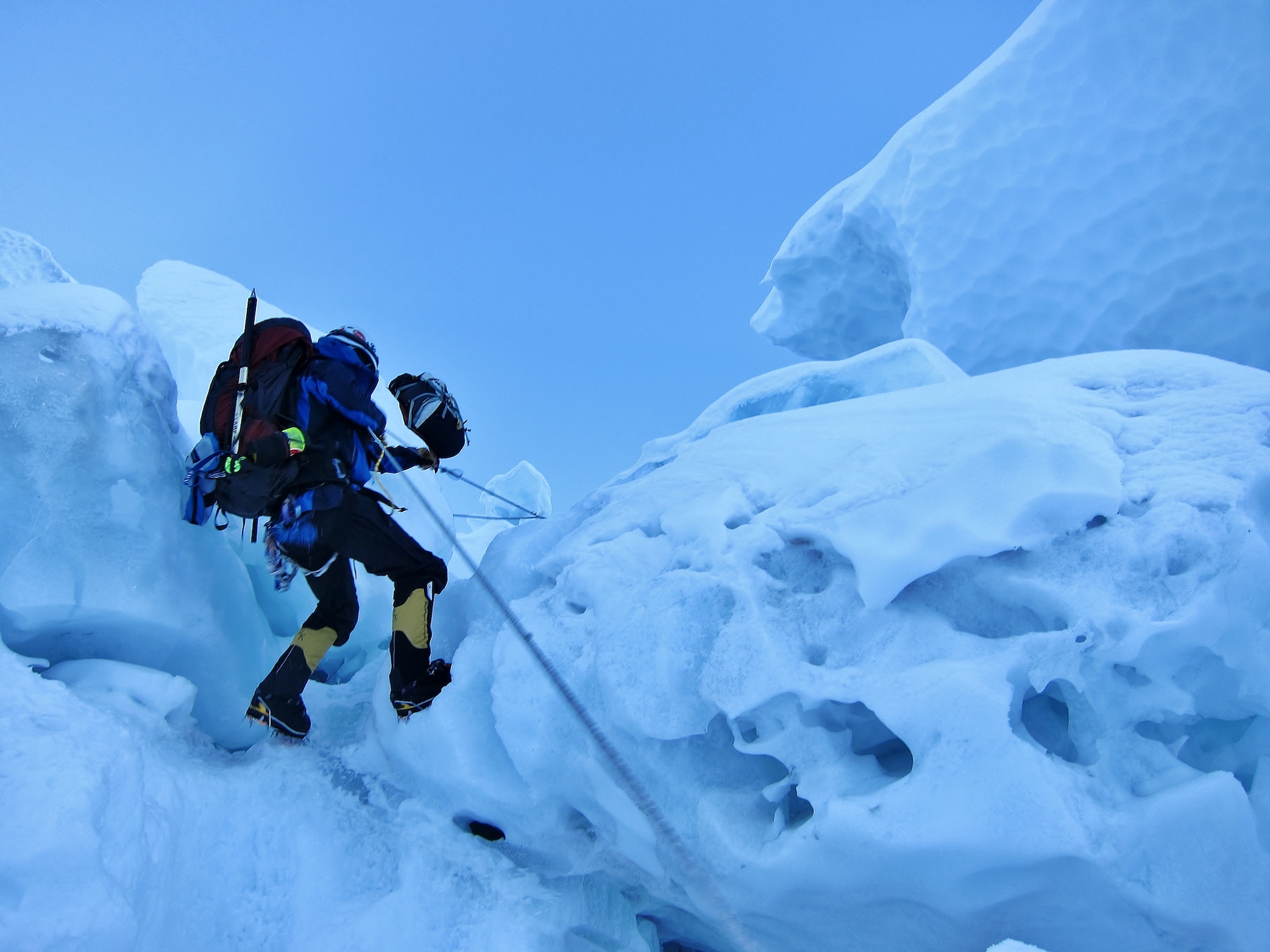 Mountaineer Capt. Marshall Klitzke mitigates the risks as he climbs Khumbu Ice Fall during the acclimatization for the Mount Everest Challenge, May 2013.