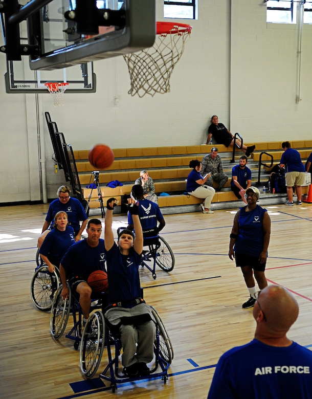 Wounded Warriors learn to play wheelchair basketball during an Air Force Wounded Warrior Adaptive Sports Training Camp at the West Fitness Center at Joint Base Andrews, Md., June 26, 2013. (U.S. Air Force photo/Senior Airman Lauren Main)