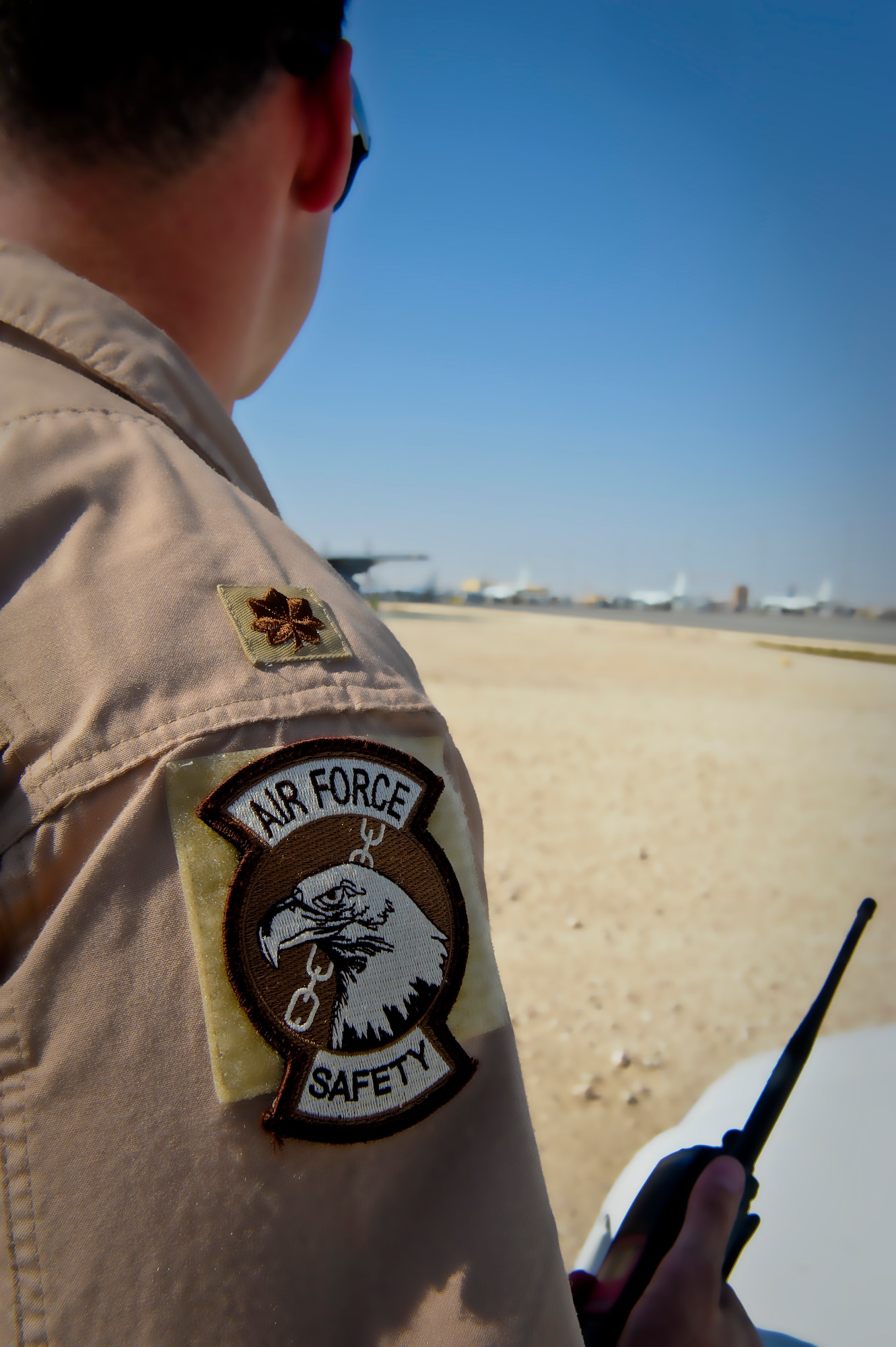 Maj. Nicholas Barnes responds to a potential flight safety incident at the 379th Air Expeditionary Wing in Southwest Asia, June 25, 2013. Barnes is a 379th AEW flight safety officer and C-40 pilot deployed from Joint Base Pearl Harbor-Hickam, Hawaii. (U.S. Air Force photo/Senior Airman Benjamin Stratton)