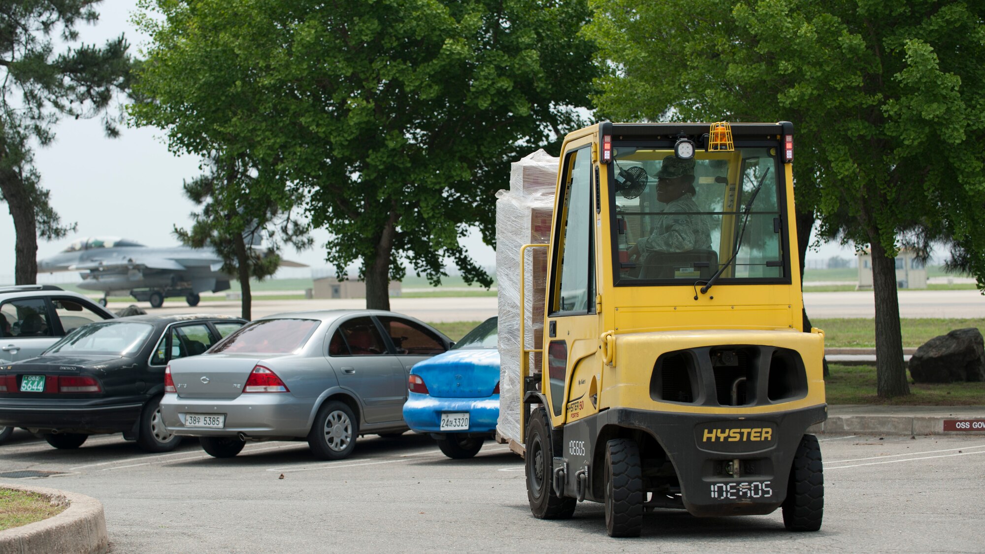 Airman 1st Class Anna Williams, 8th Logistic Readiness Squadron individual protective equipment apprentice, transports a pallet of American Red Cross supplies at Kunsan Air Base, Republic of Korea, June 17, 2013. Williams was transferring supplies to the Korean Red Cross. (U.S. Air Force photo by Senior Airman Armando A. Schwier-Morales) 