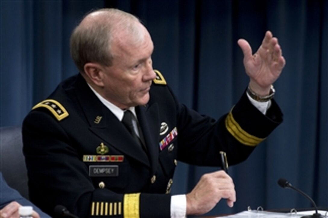 Chairman of the Joint Chiefs of Staff Gen. Martin Dempsey answers a reporter’s question during press briefing with Secretary of Defense Chuck Hagel at the Pentagon in Arlington, Va., on June 26, 2013. Hagel announced that President Barack Obama has nominated Dempsey and Vice Chairman of the Joint Chiefs of Staff Adm. James Winnefeld Jr. to a second two-year term.   