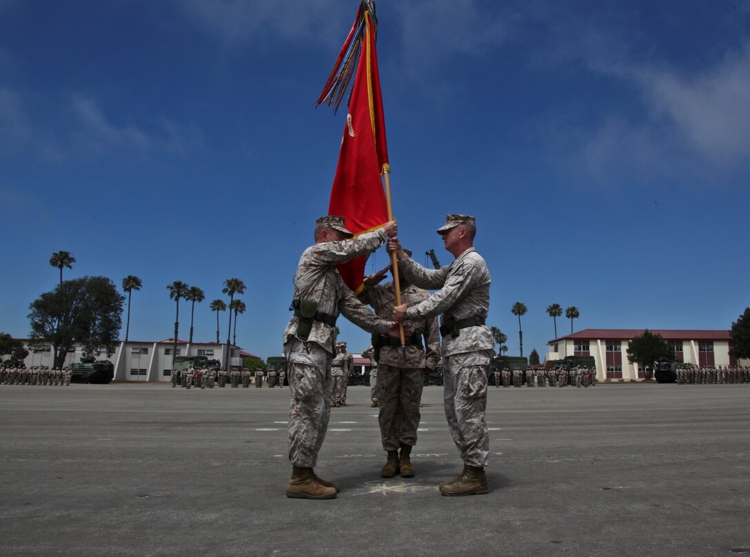 Lieutenant Col. John O’Neal assumed command of the 15th Marine Expeditionary Unit from Col. Scott D. Campbell during a change of command ceremony aboard the Camp Del Mar parade deck, June 27.
