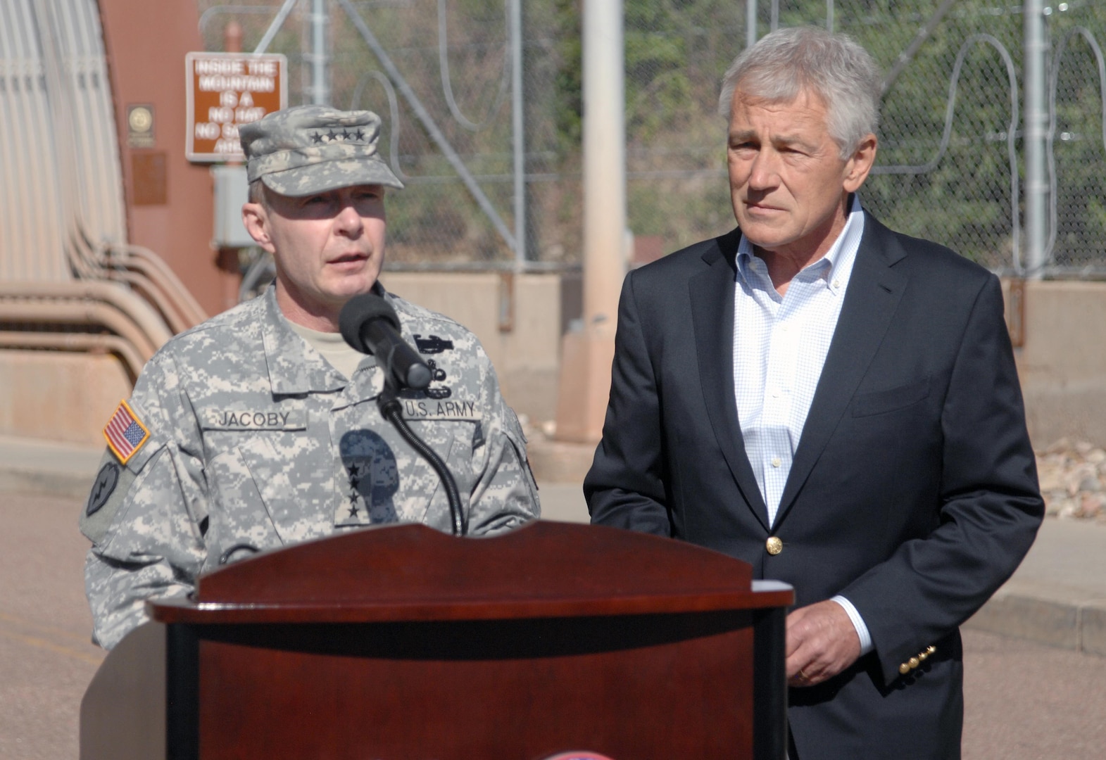 CHEYENNE MOUNTAIN AIR FORCE STATION, Colo. - Army Gen. Charles H. Jacoby, Jr., NORAD and USNORTHCOM commander, introduces Secretary of Defense Chuck Hagel at a media event at Cheyenne Mountain AFS, June 28. Hagel spoke to local and national media about his visit to Colorado Springs, efforts to address suicides in the service, sequester and sexual assault prevention. It was Hagel's first trip to Colorado Springs since he was appointed secretary of defense in February. (U.S. Air Force photo by Tech. Sgt. Thomas J. Doscher)