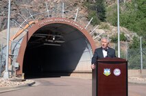CHEYENNE MOUNTAIN AIR FORCE STATION, Colo. - Secretary of Defense Chuck Hagel speaks to reporters outside the entrance to Cheyenne Mountain Air Force Station June 28. Hagel addressed issues ranging from the wildfires raging across Colorado to suicide prevention in the Armed Forces. During his first visit since his appointment as secretary of defense in February, Hagel visited the North American Aerospace Defense Command and U.S. Northern Command, spoke to troops at Fort Carson and toured Cheyenne Mountain AFS. (U.S. Air Force photo by Tech. Sgt. Thomas J. Doscher)