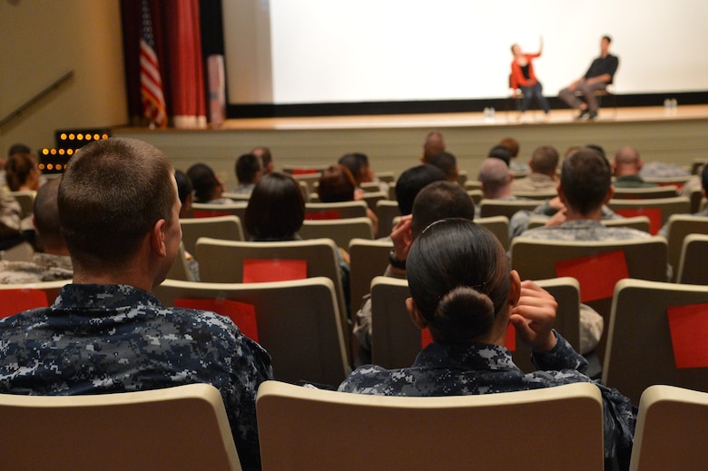 Navy, Marine and Army personnel enjoy a presentation by Sex Signals, a skit-based sexual assault prevention training, at Little Hall’s auditorium June 26, 2013. The Army personnel, stationed at Fort Belvoir, traveled more than 20 miles see the production.