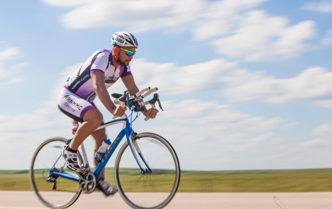 Keola Dietz, a cyclists and wounded warrior with Team Walter Reed Bethesda from Kaneohe, Hawaii, races across the 3,000 mile course of the 32nd Annual Race Across America, June 19. Team Walter Reed Bethesda is comprised of all wounded warriors that were treated at Walter Reed Hospital in Bethesda, Md.