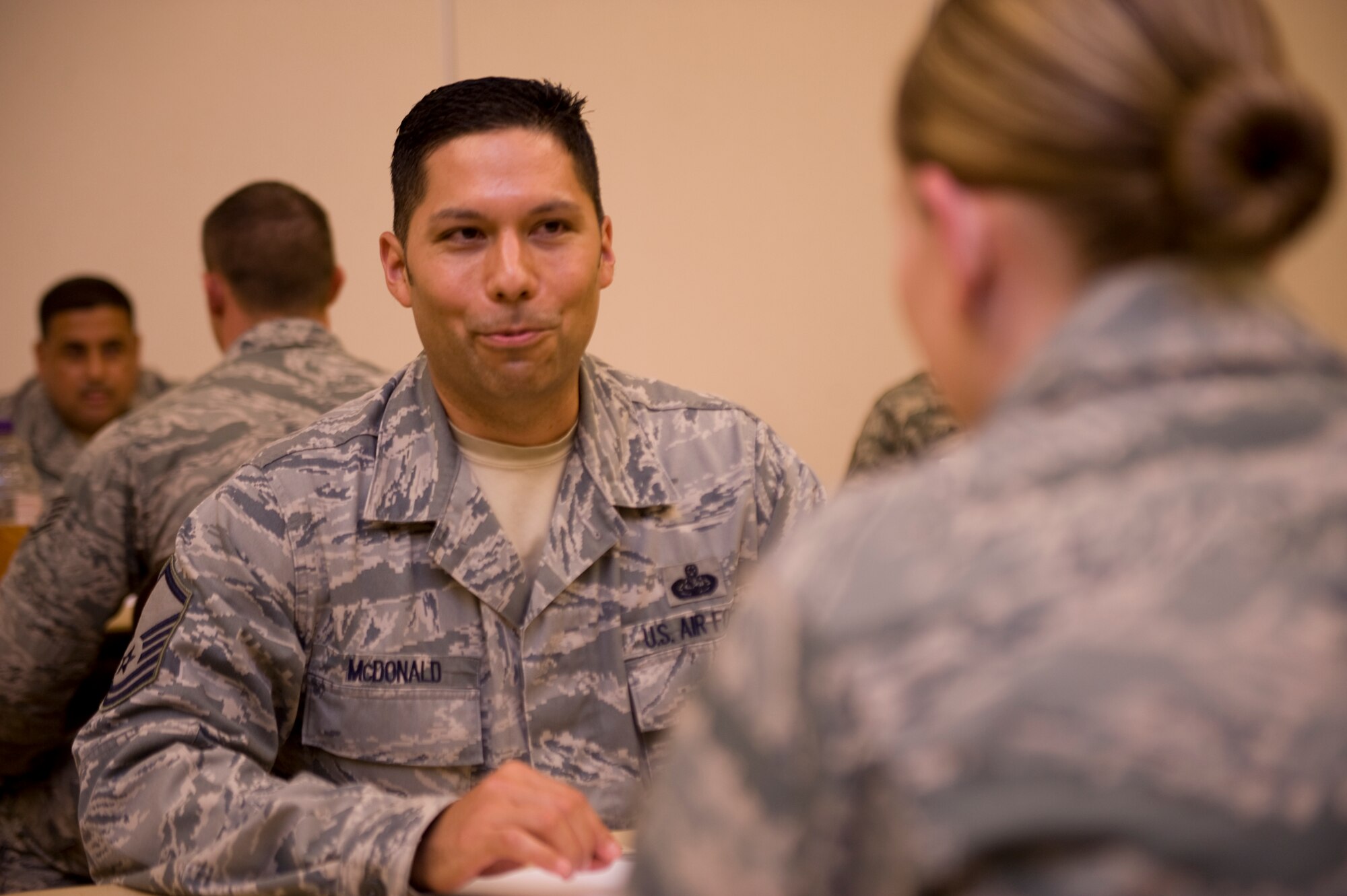 Master Sgt. Mitchell McDonald, program manager for Air Force Special Operations Command headquarters, bestows sage advice from his Air Force experiences at the Soundside Club on Hurlburt Field, Fla., June 21, 2013.  Not just Airmen, but junior NCOs also attended the event for advice on how to supervise and manage other Airmen.  (U.S. Air Force photo by Airman 1st Class Benjamin Kim) 